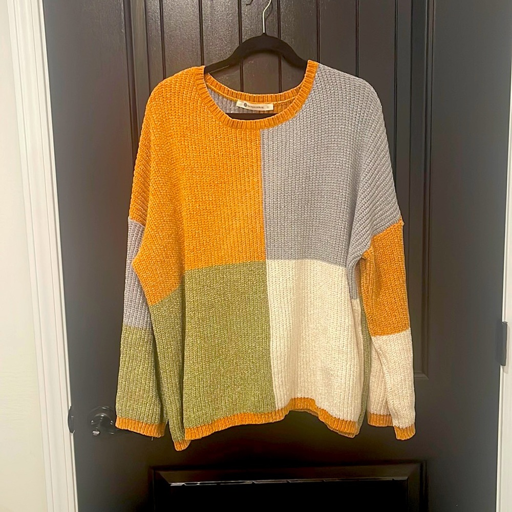 The Impeccable Pig Sweater